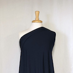 dark navy rayon lycra jersey knit draped on a mannequin